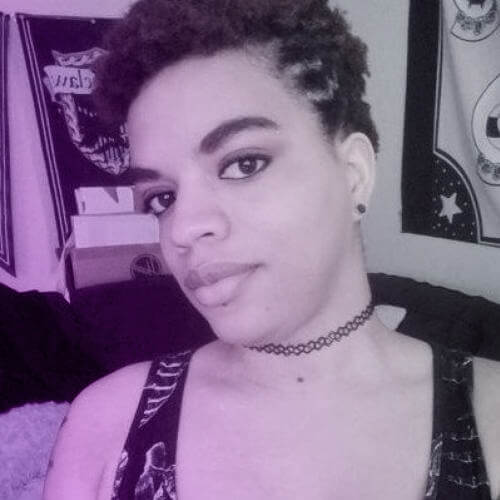 Selfie of Lynn Cyrin tilting her head towards the camera